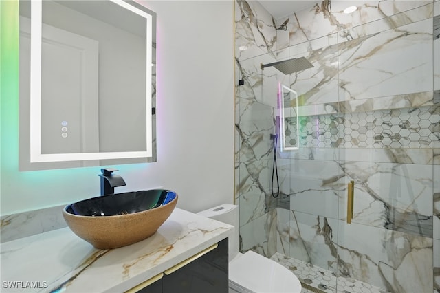 35 Chiquita Blvd N, Cape Coral, FL 33993 - bathroom with toilet, a marble finish shower, and vanity
