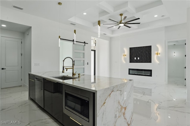 35 Chiquita Blvd N, Cape Coral, FL 33993 - kitchen featuring a sink, stainless steel appliances, modern cabinets, open floor plan, and a barn door