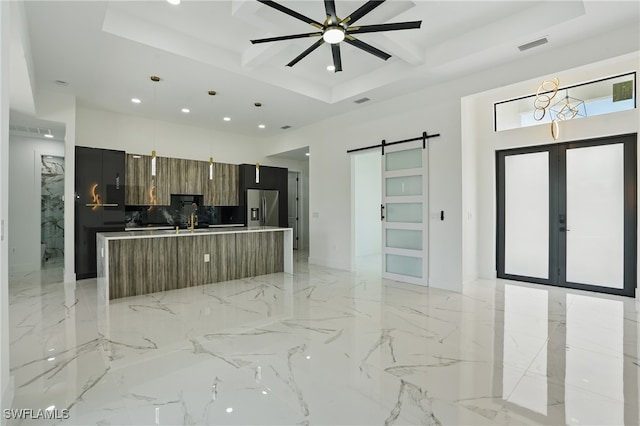 35 Chiquita Blvd N, Cape Coral, FL 33993 - kitchen featuring modern cabinets, stainless steel fridge, a barn door, recessed lighting, and coffered ceiling