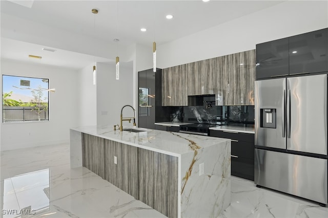 35 Chiquita Blvd N, Cape Coral, FL 33993 - kitchen featuring modern cabinets, appliances with stainless steel finishes, a sink, light marble finish floors, and tasteful backsplash