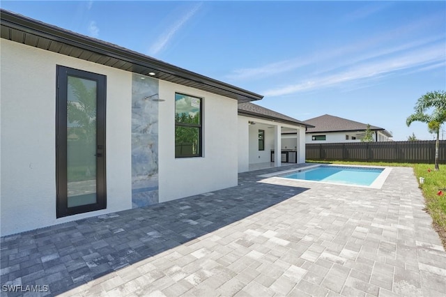 35 Chiquita Blvd N, Cape Coral, FL 33993 - view of pool featuring a fenced backyard and a patio