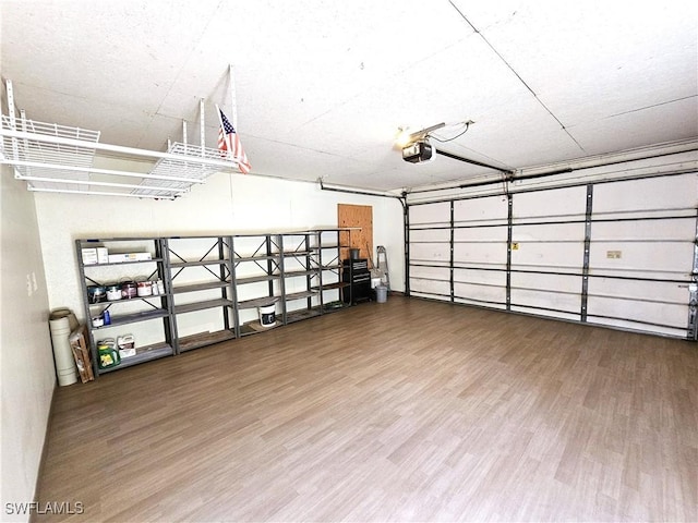 1431 Monarch Cir Unit B8, Naples, FL 34116 - garage featuring a garage door opener