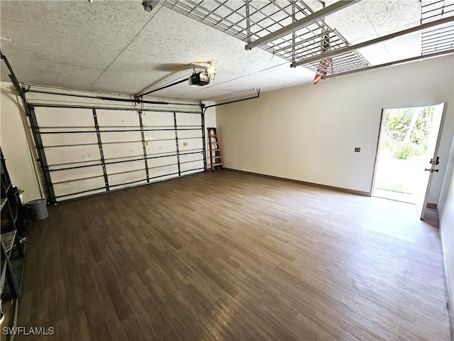 1431 Monarch Cir Unit B8, Naples, FL 34116 - garage with a garage door opener and baseboards