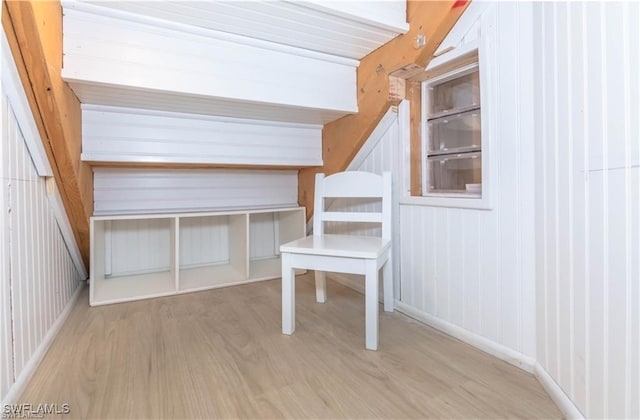 1431 Monarch Cir Unit B8, Naples, FL 34116 - unfurnished bedroom with wood finished floors and baseboards