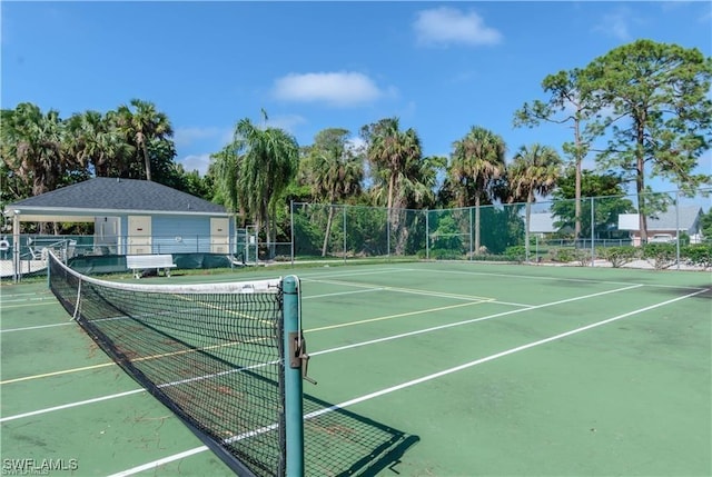 1431 Monarch Cir Unit B8, Naples, FL 34116 - view of tennis court with fence