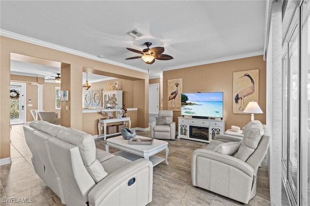 16232 Quesa Dr, Punta Gorda, FL 33955 - living area with ceiling fan, crown molding, baseboards, and light tile patterned floors
