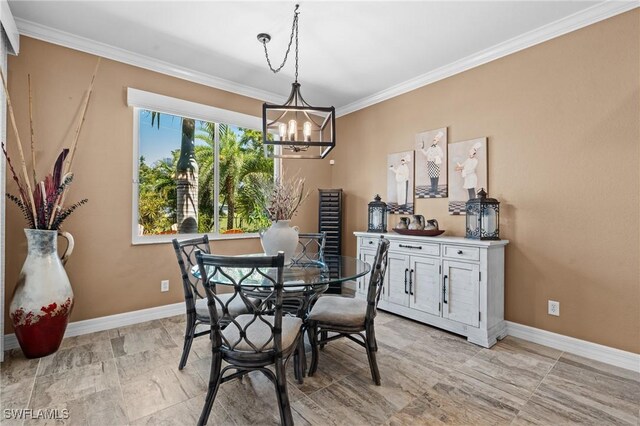 16232 Quesa Dr, Punta Gorda, FL 33955 - dining room with a chandelier, crown molding, and baseboards