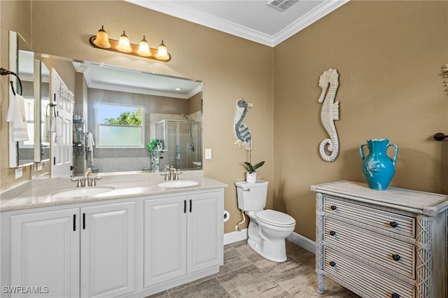 16232 Quesa Dr, Punta Gorda, FL 33955 - full bath with ornamental molding, a shower stall, toilet, double vanity, and baseboards