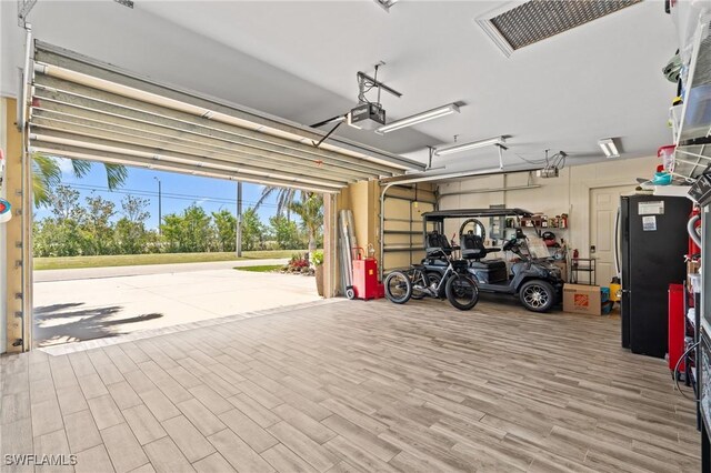 16232 Quesa Dr, Punta Gorda, FL 33955 - garage with a garage door opener