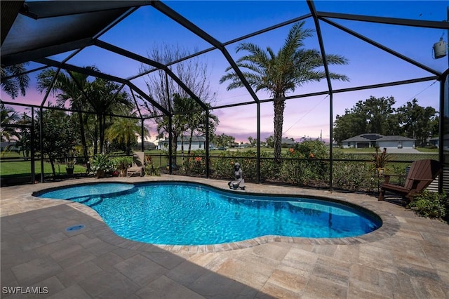 16232 Quesa Dr, Punta Gorda, FL 33955 - outdoor pool featuring a patio and glass enclosure