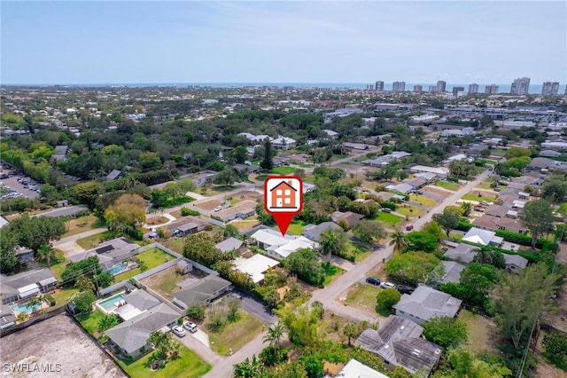 1300 Hilltop Dr, Naples, FL 34103 - aerial overview of property's location featuring nearby urban area