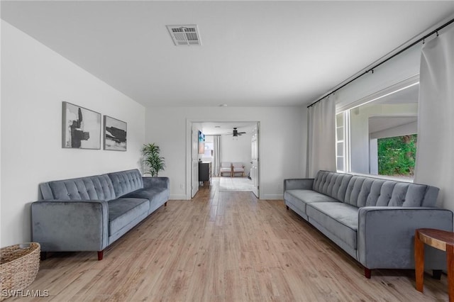 1300 Hilltop Dr, Naples, FL 34103 - living area with light wood-type flooring, baseboards, and ceiling fan