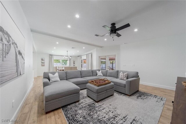 1300 Hilltop Dr, Naples, FL 34103 - living room with light wood-style flooring, recessed lighting, ceiling fan, and baseboards