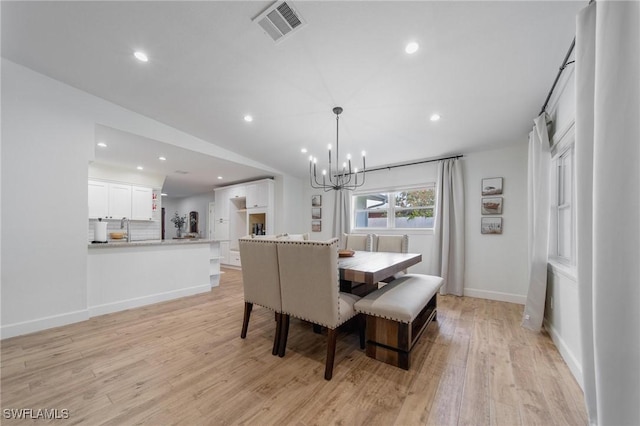 1300 Hilltop Dr, Naples, FL 34103 - dining area featuring a chandelier, light wood finished floors, recessed lighting, and baseboards