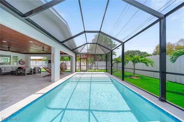 1300 Hilltop Dr, Naples, FL 34103 - view of pool with a ceiling fan, an outdoor hangout area, a patio, and a lanai