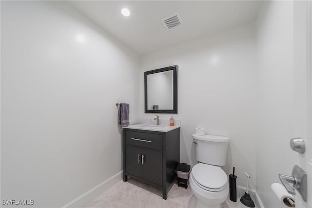 1300 Hilltop Dr, Naples, FL 34103 - bathroom featuring baseboards, toilet, and vanity