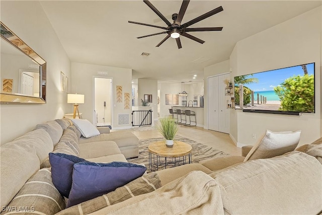 4820 SW 17th Pl Unit 6, Cape Coral, FL 33914 - living area featuring ceiling fan, light tile patterned floors, and baseboards
