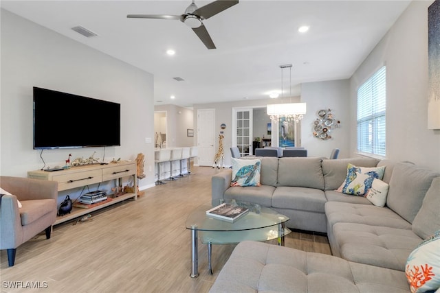 1256 Enbrook Loop, Naples, FL 34114 - living area with light wood finished floors, ceiling fan, recessed lighting, a chandelier, and baseboards