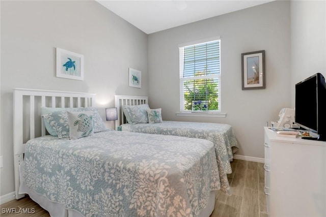1256 Enbrook Loop, Naples, FL 34114 - bedroom with wood finished floors and baseboards