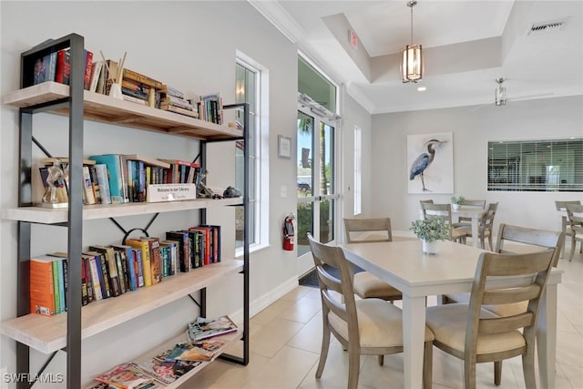 1256 Enbrook Loop, Naples, FL 34114 - dining room featuring crown molding, light tile patterned floors, and baseboards