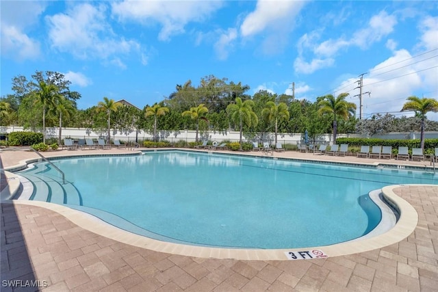 1256 Enbrook Loop, Naples, FL 34114 - community pool with a patio area