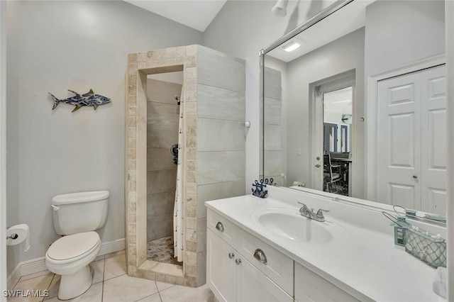 1817 Piccadilly Cir, Cape Coral, FL 33991 - full bath featuring a stall shower, vanity, toilet, tile patterned flooring, and baseboards