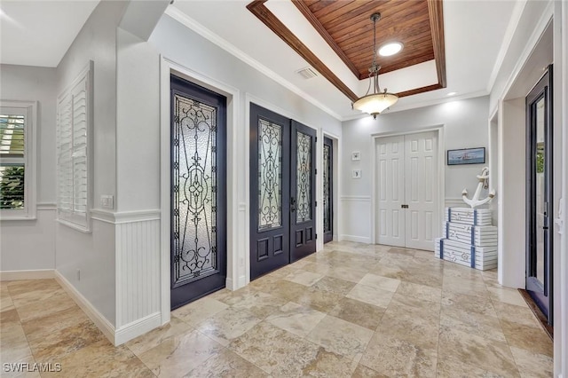 1817 Piccadilly Cir, Cape Coral, FL 33991 - foyer entrance with a raised ceiling, ornamental molding, and baseboards