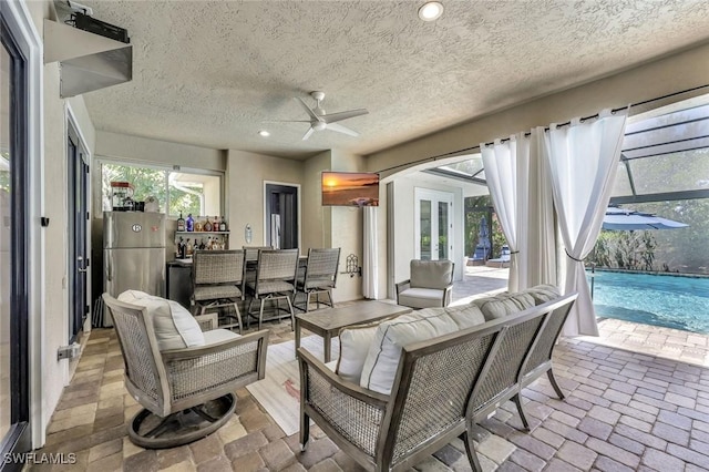 1817 Piccadilly Cir, Cape Coral, FL 33991 - living room with ceiling fan, recessed lighting, and a textured ceiling