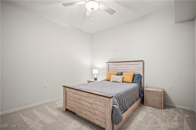10260 Heritage Bay Blvd Unit 3515, Naples, FL 34120 - bedroom featuring light carpet, baseboards, and ceiling fan