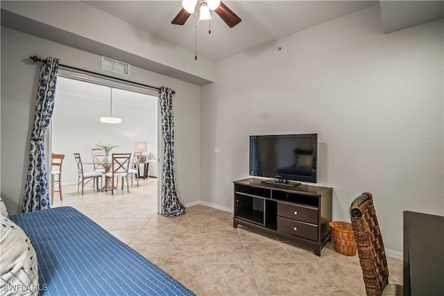 10260 Heritage Bay Blvd Unit 3515, Naples, FL 34120 - bedroom featuring light tile patterned flooring, baseboards, and a ceiling fan