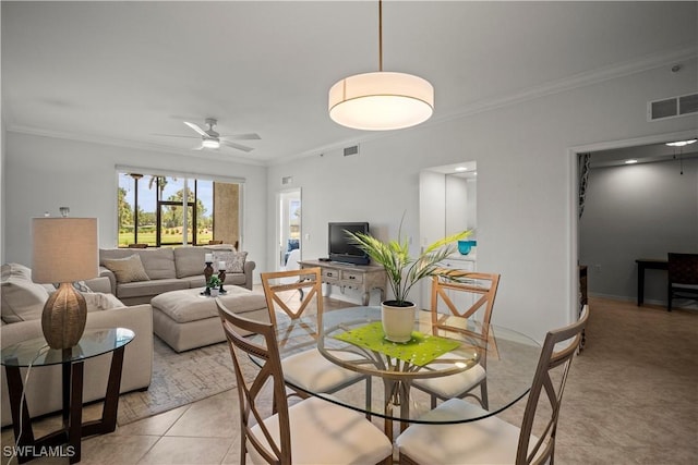 10260 Heritage Bay Blvd Unit 3515, Naples, FL 34120 - dining space with ornamental molding, ceiling fan, and light tile patterned floors