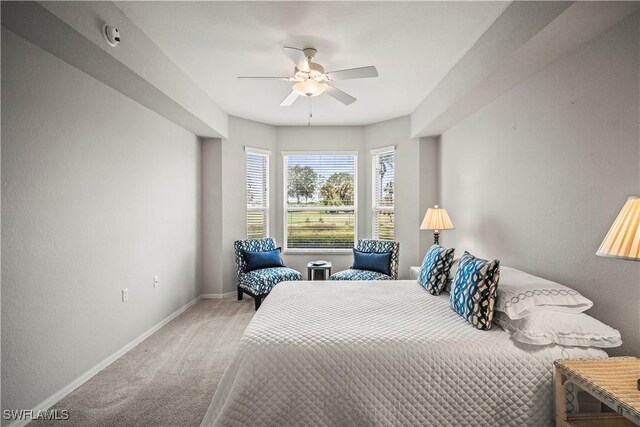 10260 Heritage Bay Blvd Unit 3515, Naples, FL 34120 - carpeted bedroom with baseboards and a ceiling fan