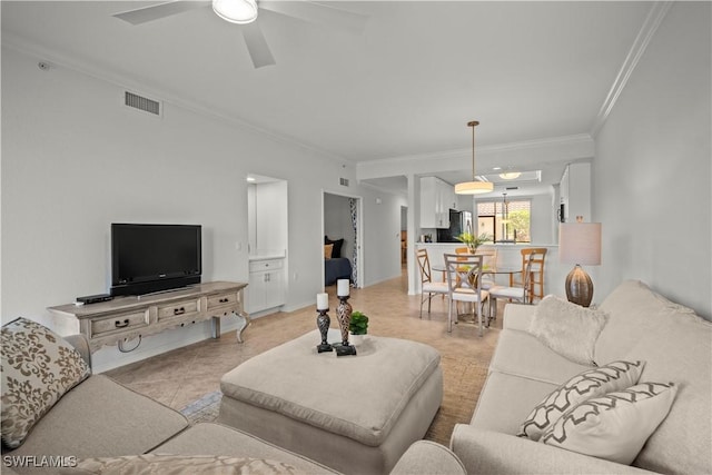 10260 Heritage Bay Blvd Unit 3515, Naples, FL 34120 - living area with ornamental molding, ceiling fan, and light tile patterned flooring
