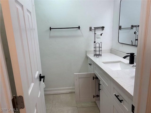1185 Cherrystone Ct Unit A, Naples, FL 34102 - bathroom with tile patterned flooring, vanity, and baseboards