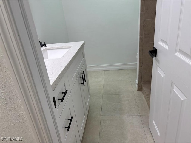 1185 Cherrystone Ct Unit A, Naples, FL 34102 - bathroom featuring vanity, tile patterned floors, and baseboards