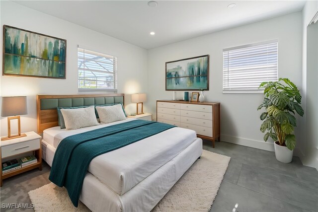 2564 Poinciana St, Naples, FL 34105 - bedroom with baseboards, finished concrete floors, and recessed lighting