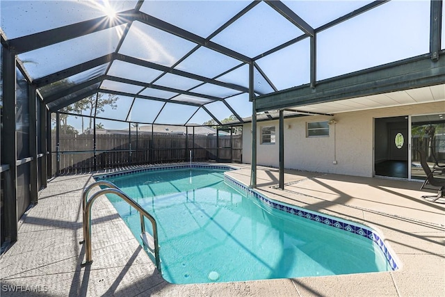 2564 Poinciana St, Naples, FL 34105 - view of pool with a patio area, a fenced backyard, and glass enclosure
