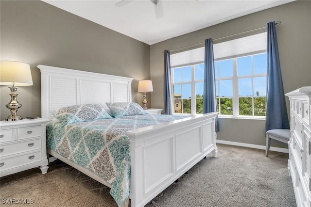 11711 Pasetto Ln Unit 407, Fort Myers, FL 33908 - carpeted bedroom featuring baseboards and a ceiling fan