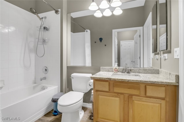 11711 Pasetto Ln Unit 407, Fort Myers, FL 33908 - bathroom featuring a chandelier, bathing tub / shower combination, toilet, and vanity