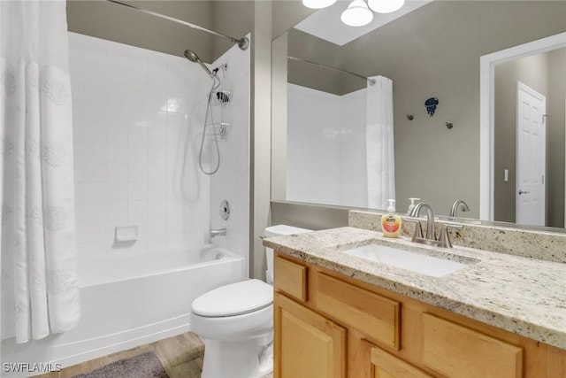 11711 Pasetto Ln Unit 407, Fort Myers, FL 33908 - bathroom featuring shower / bath combo, toilet, vanity, and wood finished floors