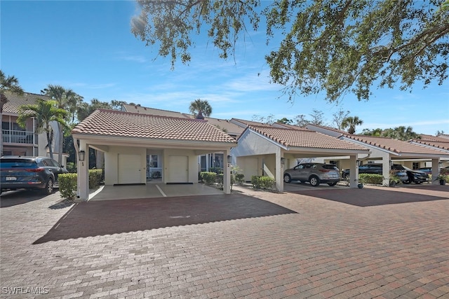 2305 Hidden Lake Dr Unit 3704, Naples, FL 34112 - view of front of property with a tile roof and stucco siding