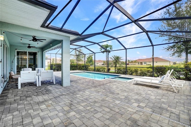 2369 Tangerine Ln, Naples, FL 34120 - swimming pool featuring a patio area, a ceiling fan, a lanai, and a jacuzzi