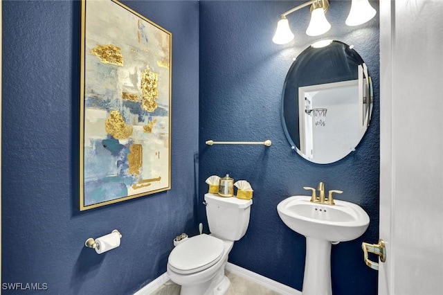 2369 Tangerine Ln, Naples, FL 34120 - half bath featuring toilet and baseboards