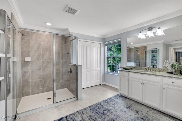 2369 Tangerine Ln, Naples, FL 34120 - bathroom with a shower stall, ornamental molding, vanity, and a chandelier
