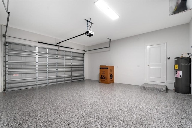 16077 Coruna Ct, Punta Gorda, FL 33955 - garage featuring electric water heater and a garage door opener