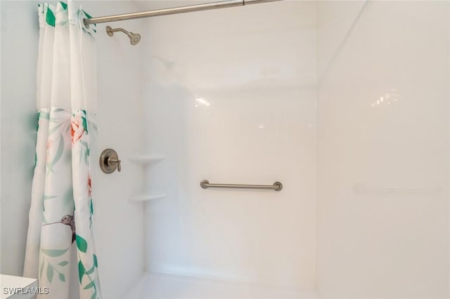 6461 Aragon Way Unit 102, Fort Myers, FL 33966 - bathroom with a shower with shower curtain
