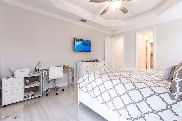 bedroom with a raised ceiling, ornamental molding, ceiling fan, and baseboards