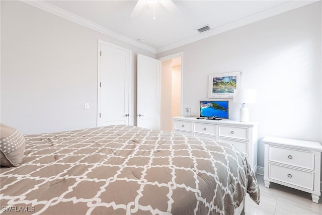 unfurnished bedroom featuring ornamental molding and ceiling fan