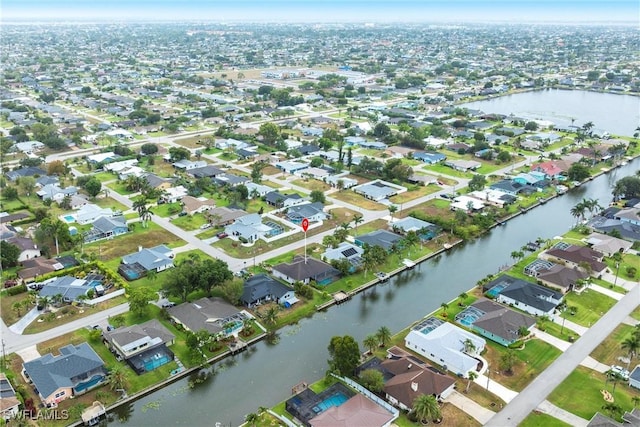 view of property location with nearby suburban area and a nearby body of water