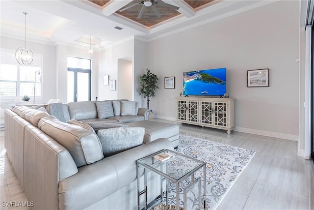 living room with coffered ceiling, a ceiling fan, crown molding, baseboards, and beamed ceiling